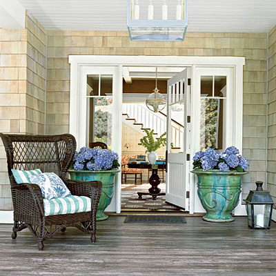 Pacific Palisades Home front porch with flowers in pots